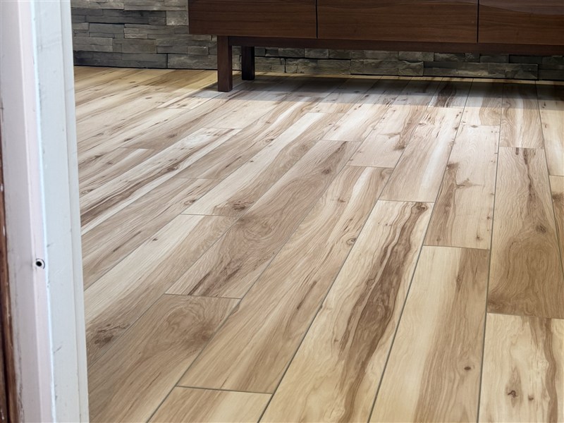 Vinyl plank flooring and stone accent wall — featured project